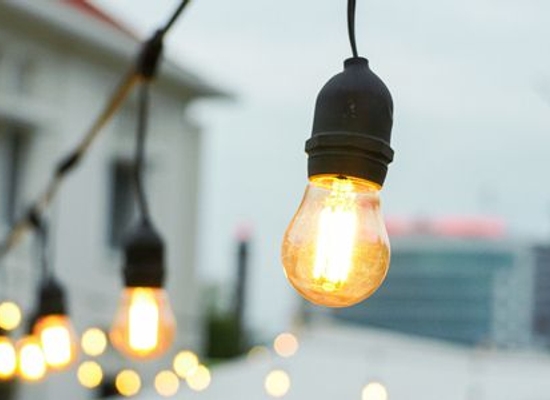 string lights with large bulbs in an outdoor space
