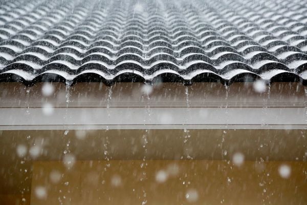A roof with rain on it. 