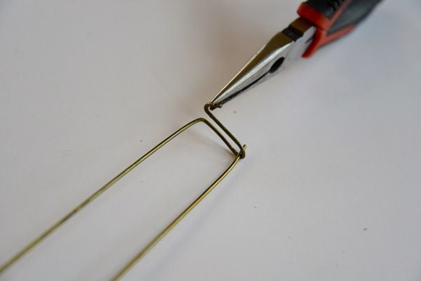 bend safety pin with pliers