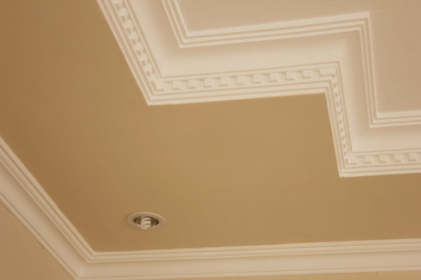 Crown molding on a ceiling. 