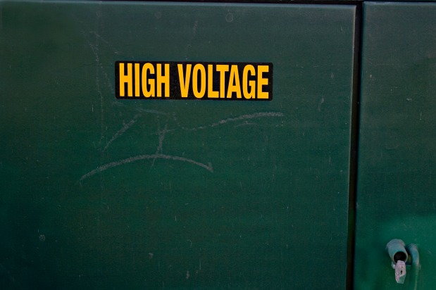 sign that reads high voltage