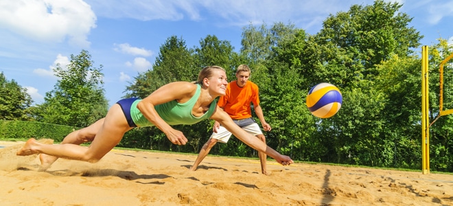How to Make a Sand Volleyball Court in Your Yard ...