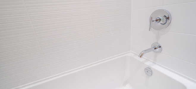 How to Apply Peel-and-Stick Vinyl Tiles to Bathroom Walls ...