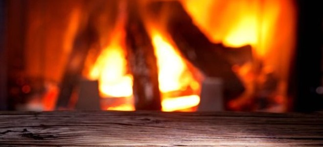 A burning fireplace.