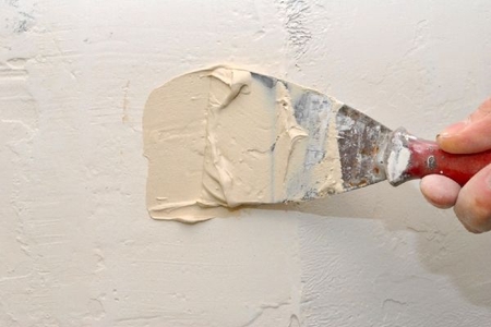 How to Add Drywall to the Bare Concrete Walls of a 