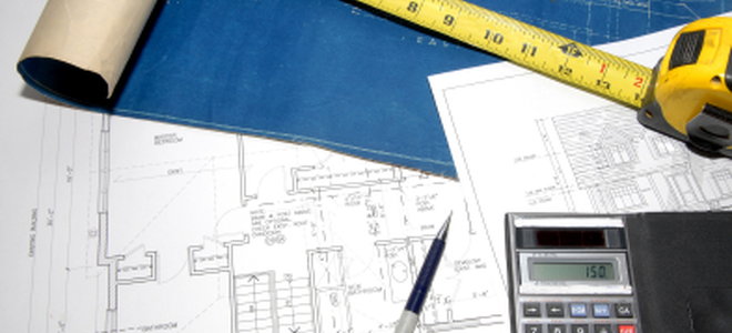 blueprint, calculator, and tape measure
