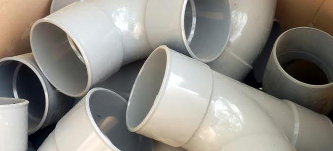 A pile of PVC pipes. 