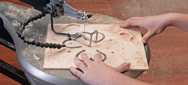 using scroll saw to cut wood