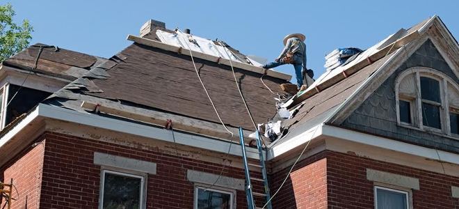 people working on a roof