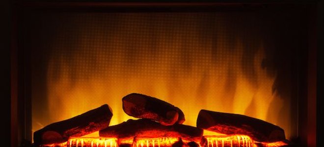 An electric fireplace that is switched on.