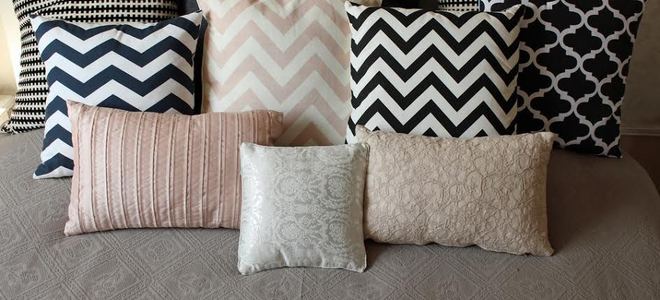 A collection of pillows in different patterns.