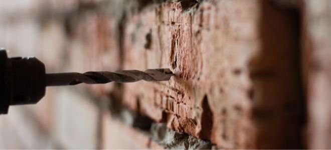 Drilling into brick