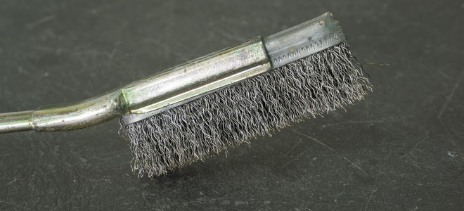 A wire brush. 