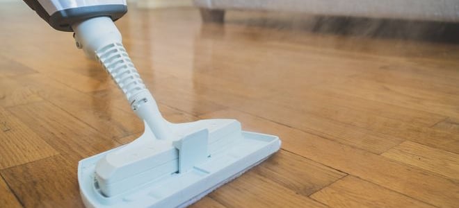 steam mopping a wood floor
