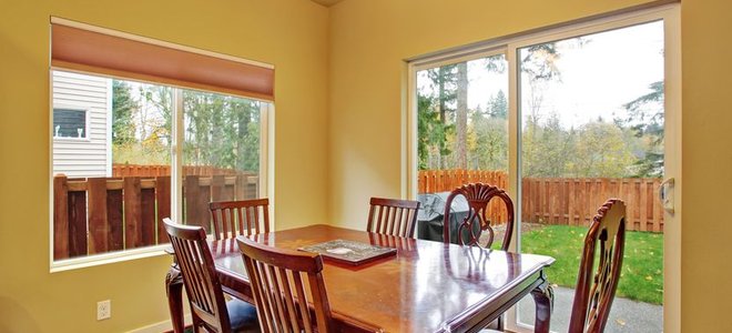 A sliding glass door leading to a backyard.