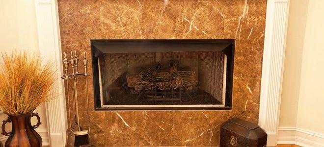 marbled fireplace with mantle surround