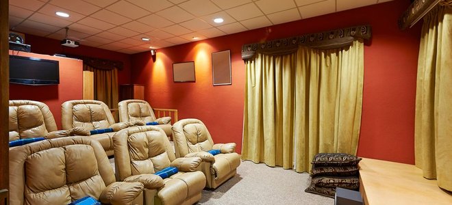 home theater with theater seating and stage