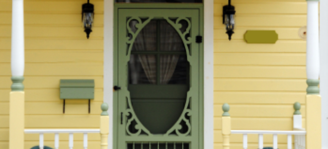 Yellow house with locking screen door