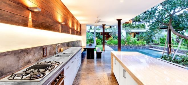 outdoor kitchen space with cool lighting and design