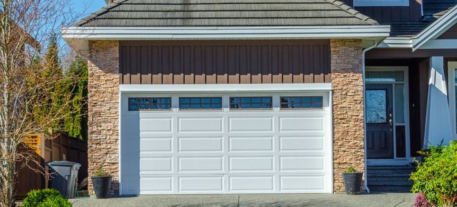 A garage with a white door.