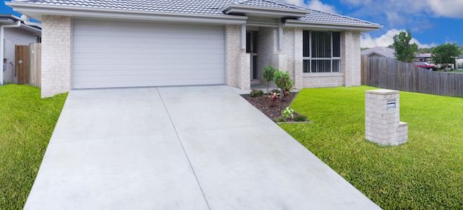 house with concrete driveway