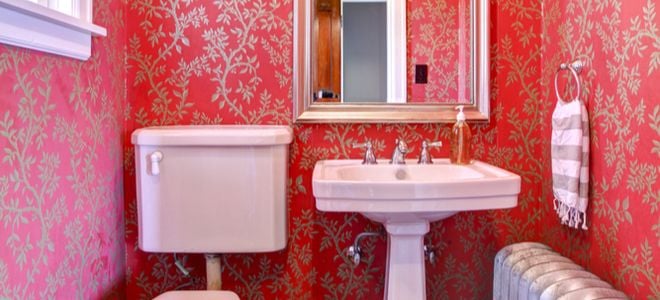 bathroom with red wallpaper