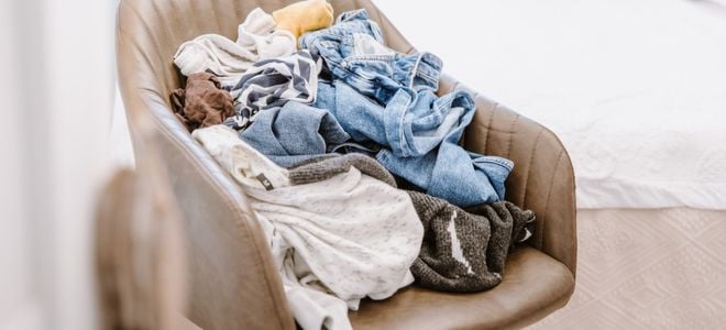 a pile of laundry in a chair