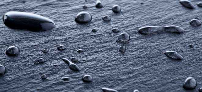 slate stone with drops of water