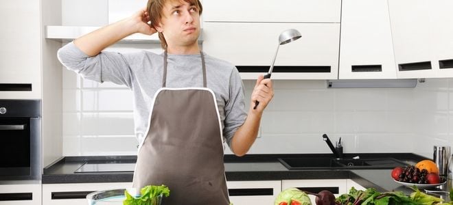 confused man in kitchen