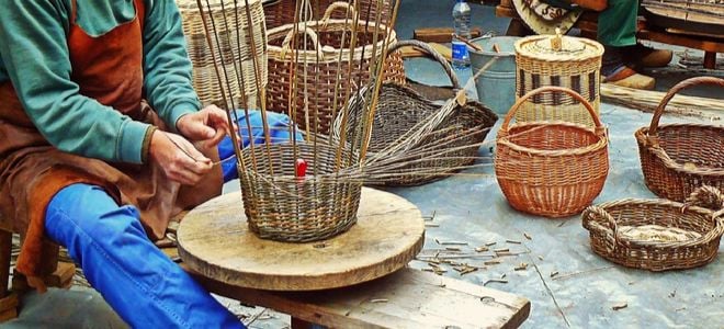 man making wicker baskets