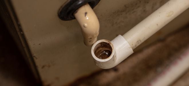 pvc pipes with built up water from hvac condensation