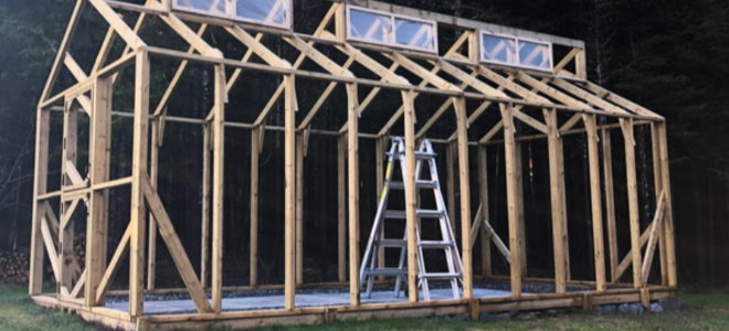 large wooden greenhouse frame