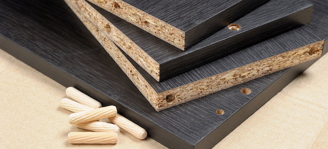 particle board pile with dowel rod fasteners