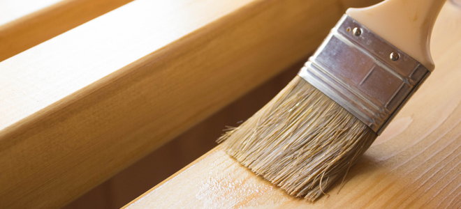 Applying varnish with a brush