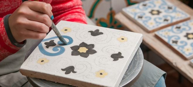 hand painting design on ceramic tile