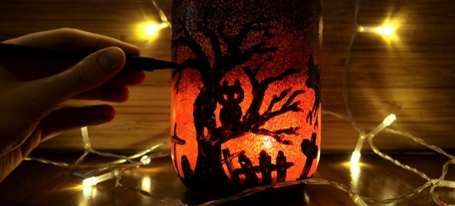 marker and paint on lighted halloween mason jar