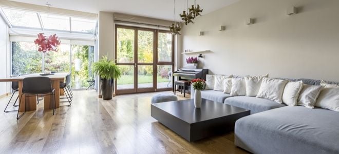 open minimalist living room with wooden floors