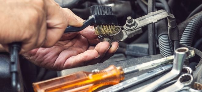 metal brush cleaning car battery connection