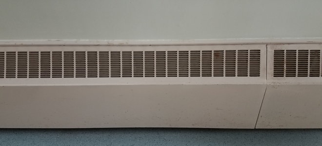 slightly rusty baseboard heater