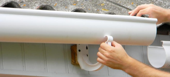 Installing a gutter on a house