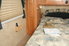 The interior of a bed inside an RV. 