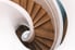wooden spiral staircase with beautiful curved railing