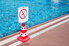 no diving sign on the side of an underground pool