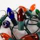 A tangled string of large-bulb Christmas lights.
