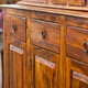A series of bottom cabinets made from wood.