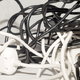 cluttered pile of electric cords and cables