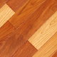 A close-up on a small section of hardwood floor.