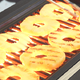 Pineapple slices on a grill