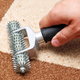carpet roller over seams with contrasting natural colors