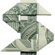 dollar bill folded into a dollar sign